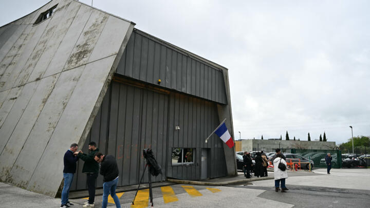 Journalists gather in front of the Toulon-La Farlede prison ahead of a visit of the French Minister of Justice on April 15, 2025.