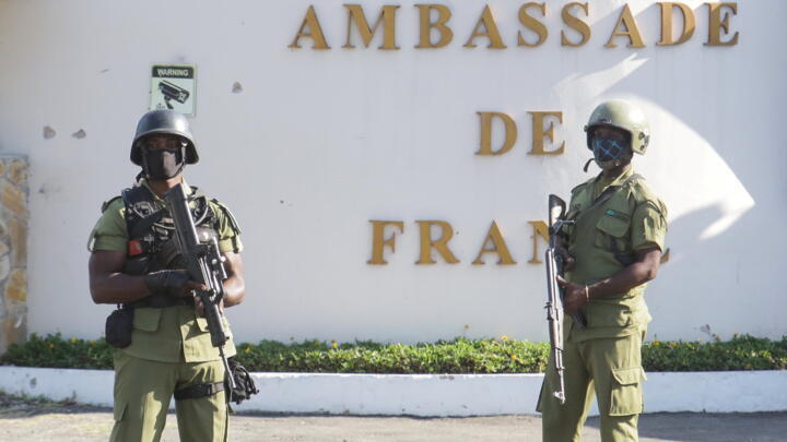 Tanzanian security forces guard an entrance to the French Embassy after an attacker wielding an assault rifle was killed in the Salenda area of Dar es Salaam, Tanzania