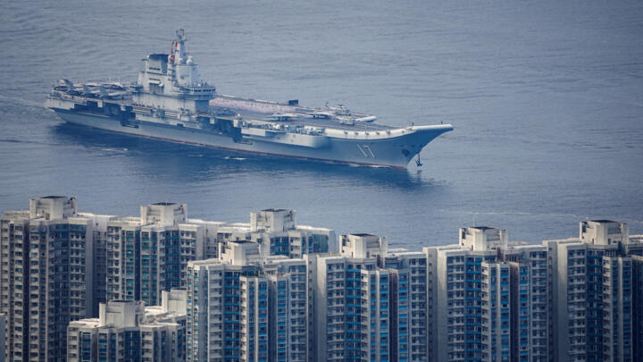 The People's Liberation Army Navy aircraft carrier Shandong, China's first domestically built aircraft carrier, sails into Hong Kong for a five-day visit, in Hong Kong, China, July 3, 2025.