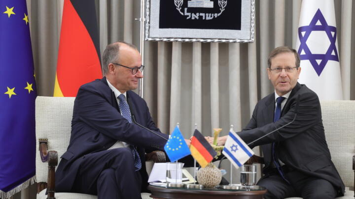 German Chancellor Friedrich Merz, left, and Israel's President Isaac Herzog, right, meet at the president's residence in Jerusalem, Israel, on December 6, 2025