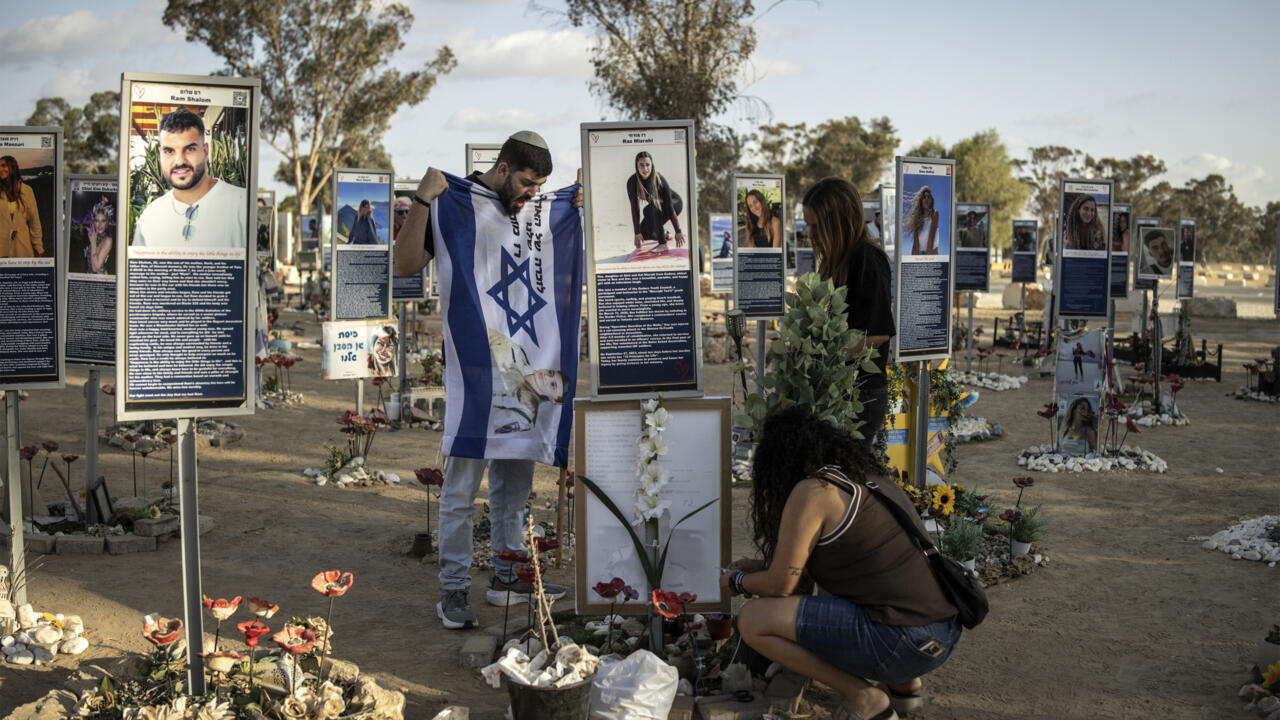 Memorial ceremony marking October 7 anniversary in Israel with families gathering to remember victims