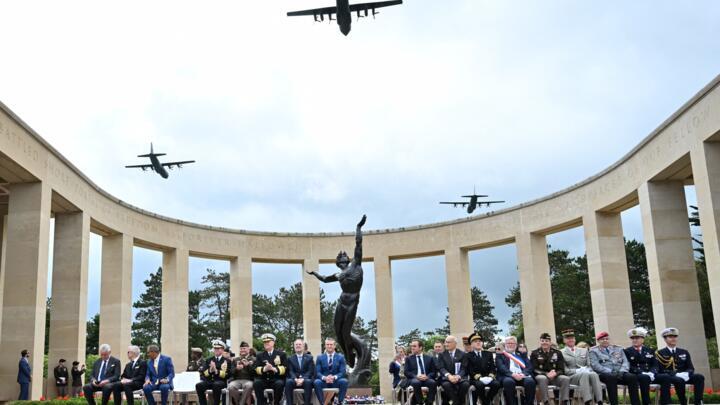 Military aircraft perform a flyover during the 81st anniversary of the World War II D-Day Allied landings in Normandy, at the American Cemetery in Colleville-sur-Mer, France, on June 6, 2025.