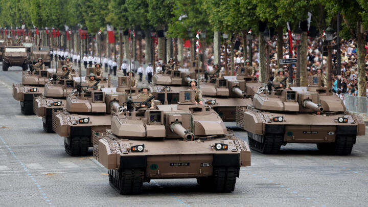 French Army Chars Leclerc XLR are navigated to parade during the annual Bastille Day military parade on the Champs-Elysees