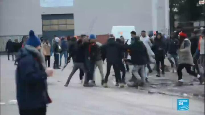 Migrants in critical condition after Calais brawl