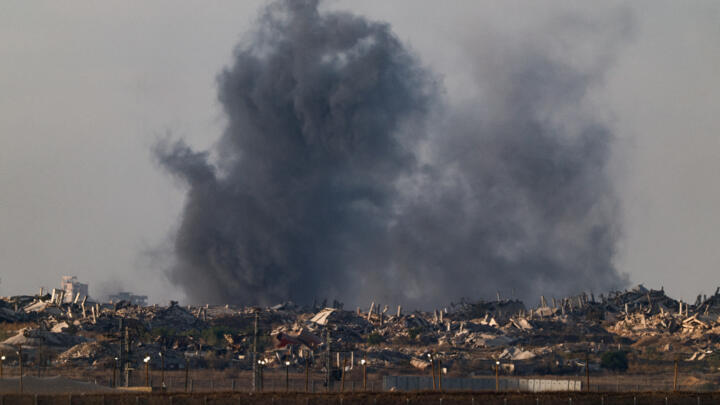 Smoke rises from Gaza following an explosion, as seen from Israel, October 19, 2025