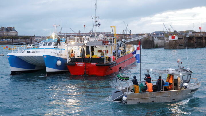 French fishermen block the 'Normandy Trader' boat at the port of Saint-Malo, France, November 26, 2021.