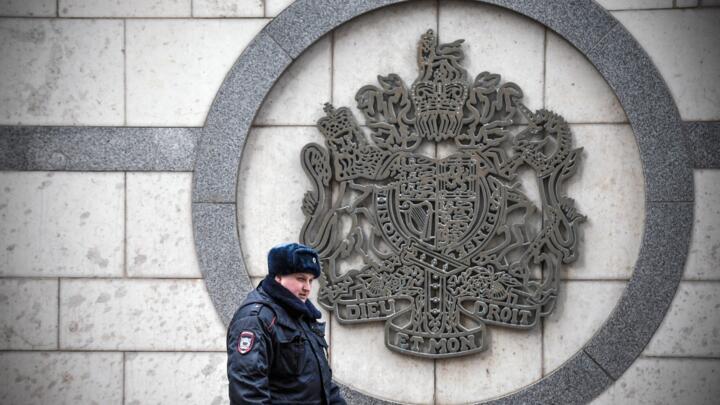 A police officer patrols outside the British embassy building in Moscow on March 14, 2018.