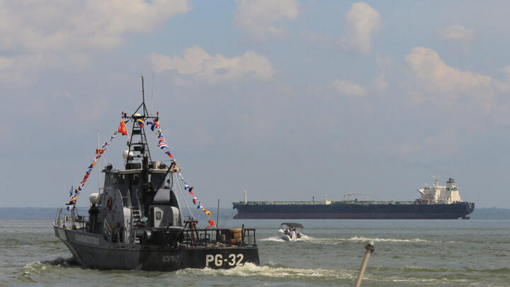 Members of the Venezuelan Coast Guard conduct a reinforced security patrol on Lake Maracaibo amid growing tensions between Venezuela and the United States, in Maracaibo, Venezuela, on October 26, 2025