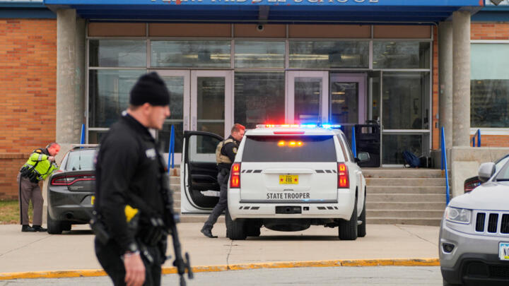 Law enforcement officers respond to a school shooting at the Perry Middle School and High School complex in Perry, Iowa, US on January 4, 2024.