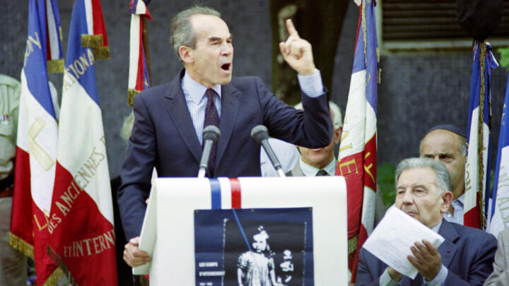 The president of the Constitutional Council, Robert Badinter, angrily addresses those who booed French President François Mitterrand on July 16,1992 during the 50th anniversary of the Vel' d'Hiv round