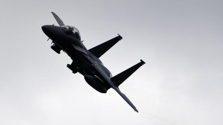 A F15 jet of the US Air Force flies overhead during the 'Dynamic Front 23', the US Army-led NATO and Partner integrated annual artillery exercise in Europe, in Grafenwoehr, near Eschenbach, southern Germany, on March 28, 2023. 