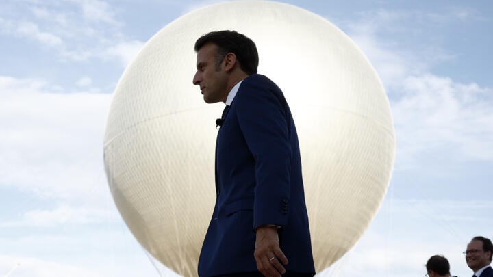 On the rise: French President Emmanuel Macron at the reinstallation of the Olympic cauldron at the Tuileries Garden in Paris, on June 12. 
