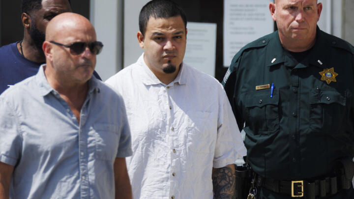 Kilmar Abrego Garcia, centre, leaves the Putnam County Jail, Friday, August 22, 2025, in Cookeville, Tennessee.