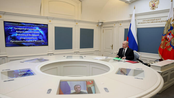 Russia's President Vladimir Putin inspects a military exercise via a video link from Moscow on October 25, 2023.