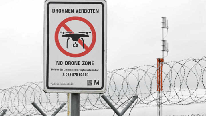 A sign with a drone ban is displayed outside the airport in Munich, Germany on October 6, 2025. 
