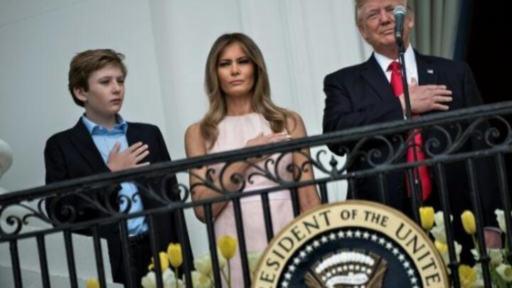 First lady nudges Trump over national anthem 