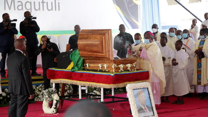 Catholic Archbishop of Dar es Salaam Jude Thaddaeus Ruwa'ichi spreads incense during the state funeral of President Magufuli at Uhuru stadium, Dar es Salaam, Tanzania on March 20, 2021.