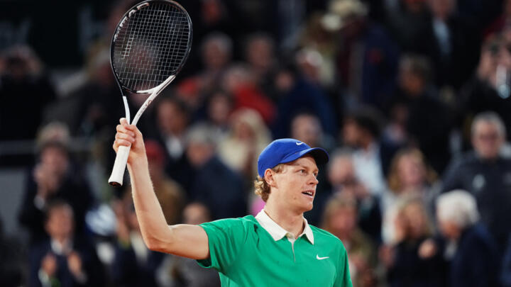 Italy's Jannik Sinner celebrates after winning his men's singles semi-final match against Serbia's Novak Djokovic on day 13 of the French Open tennis tournament in Paris on June 6, 2025.
