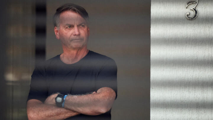 Brazil's former President Jair Bolsonaro is pictured while under house arrest in Brasi­lia, on  August 14, 2025, as he awaits trial over an alleged plot to overturn the 2022 presidential election.