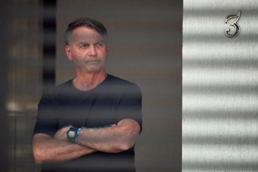 Brazil's former President Jair Bolsonaro is pictured while under house arrest in Brasi­lia, on  August 14, 2025, as he awaits trial over an alleged plot to overturn the 2022 presidential election.