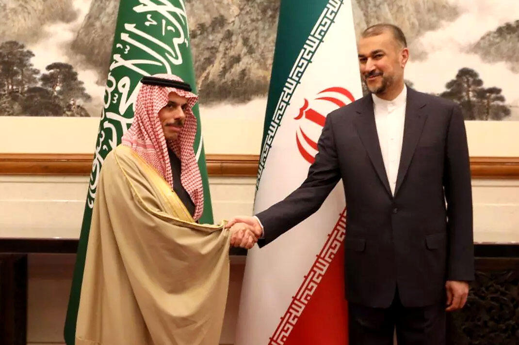 Saudi Arabian Foreign Minister Faisal bin Farhan (left) shook hands with Iranian Foreign Minister Hossein Amir Abdullahian in Beijing in April, sealing last month's surprise reconciliation deal.