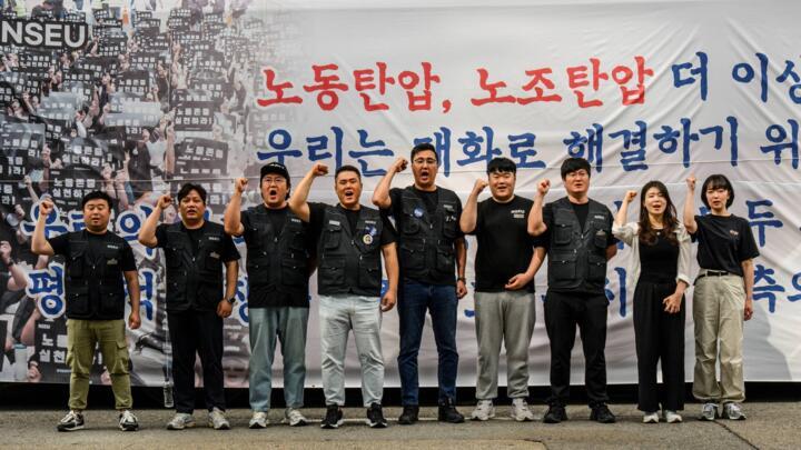 National Samsung Electronics Union members shout slogans during a rally outside the company building in Seoul on June 7, 2024, as workers at the tech giant staged their first-ever strike.