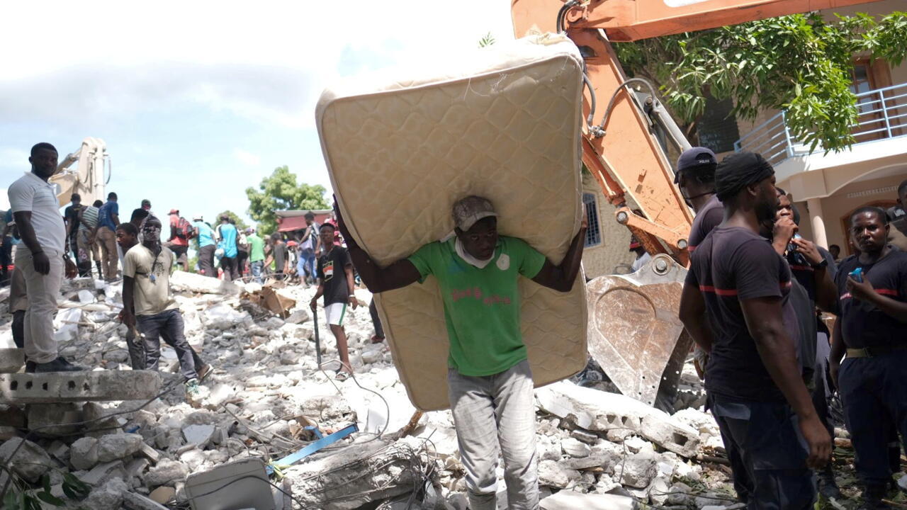 Search For Haiti Quake Survivors Continues As Storm Approaches