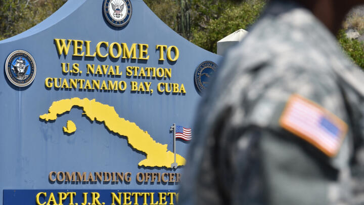 A welcome board at the road to the US Naval Station in Guantanamo Bay, Cuba, on April 7, 2014. 
