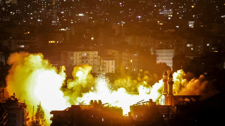 Smoke and fire errupt from the site of an Israeli airstrike on Beiruts southern suburbs on June 5, 2025.