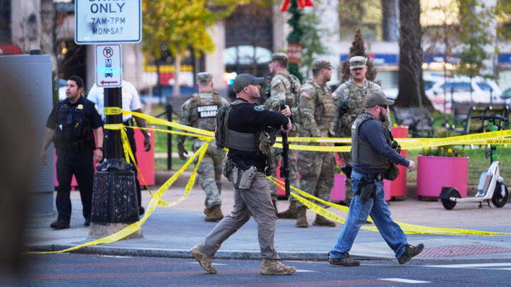 US Marshalls and National Guard troops are seen after reports of two National Guard soldiers shot near the White House in Washington, onWednesday November 26, 2025.