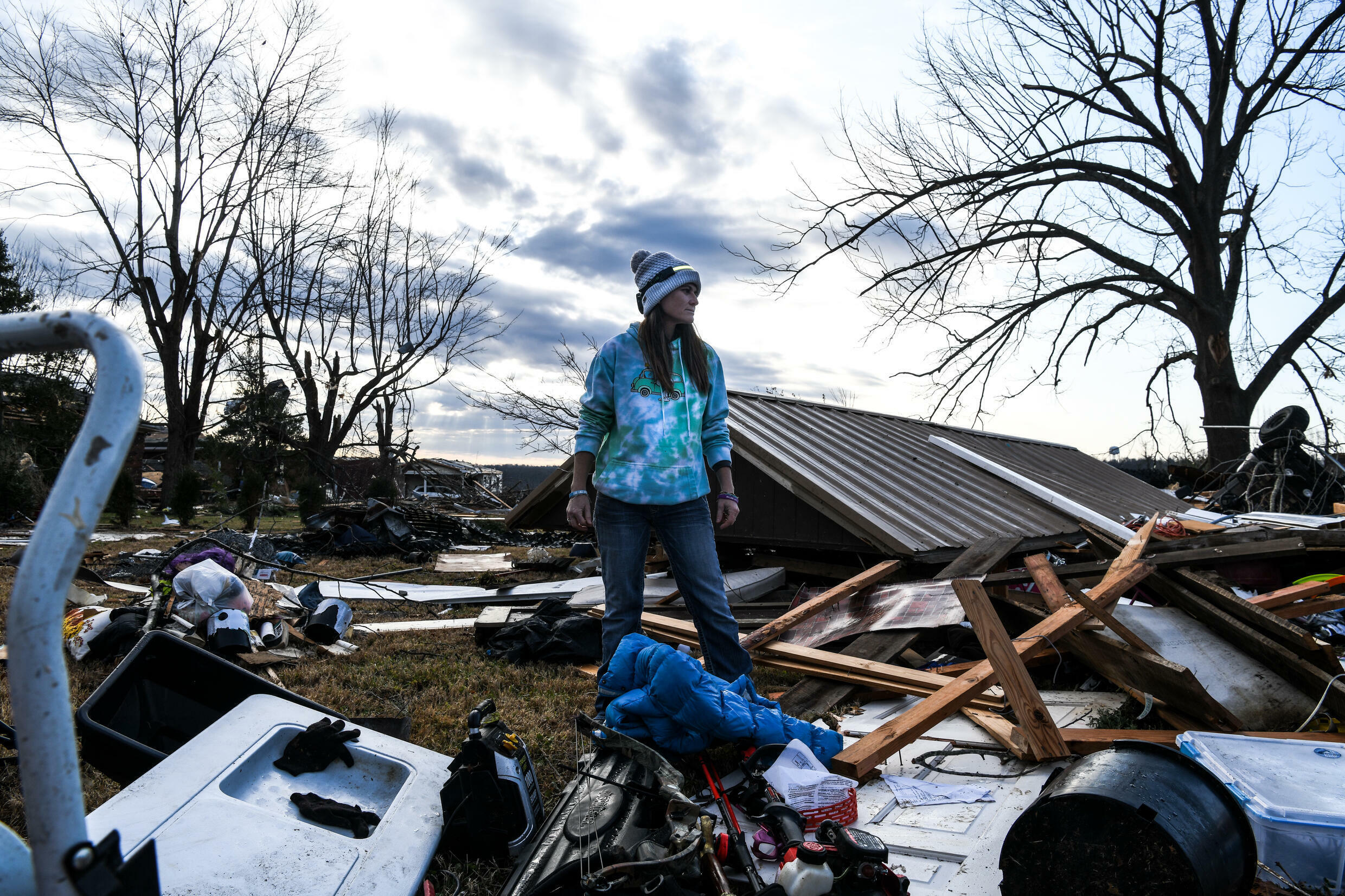 Ashley McKnight searched through the rubble of her home destroyed by a tornado that struck Dawson Springs, Kentucky, on December 14, 2021