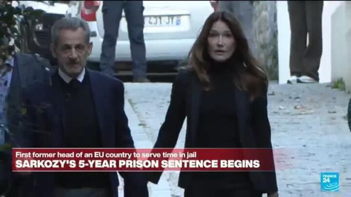 Nicolas Sarkzoy leaves home for prison in front of family and supporters