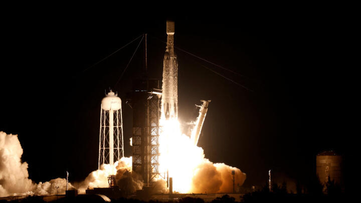 The US military's secretive X-37B robot spaceplane lifts off on its seventh mission to orbit, the vehicle's first launch atop a SpaceX Falcon Heavy rocket capable of lofting it far higher than ever be