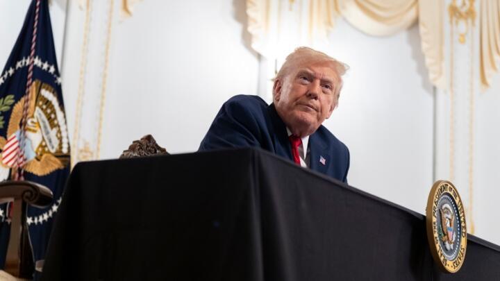 US President Donald Trump speaks to the press after holding a virtual audience with troops from his Mar-a-Lago estate in Palm Beach, Florida, on November 27, 2025.