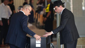 The coffin of Rabbi Yaakov Levitan, a victim in the Bondi Beach mass shooting, is carried into a chapel for his funeral in Sydney, on December 17, 2025