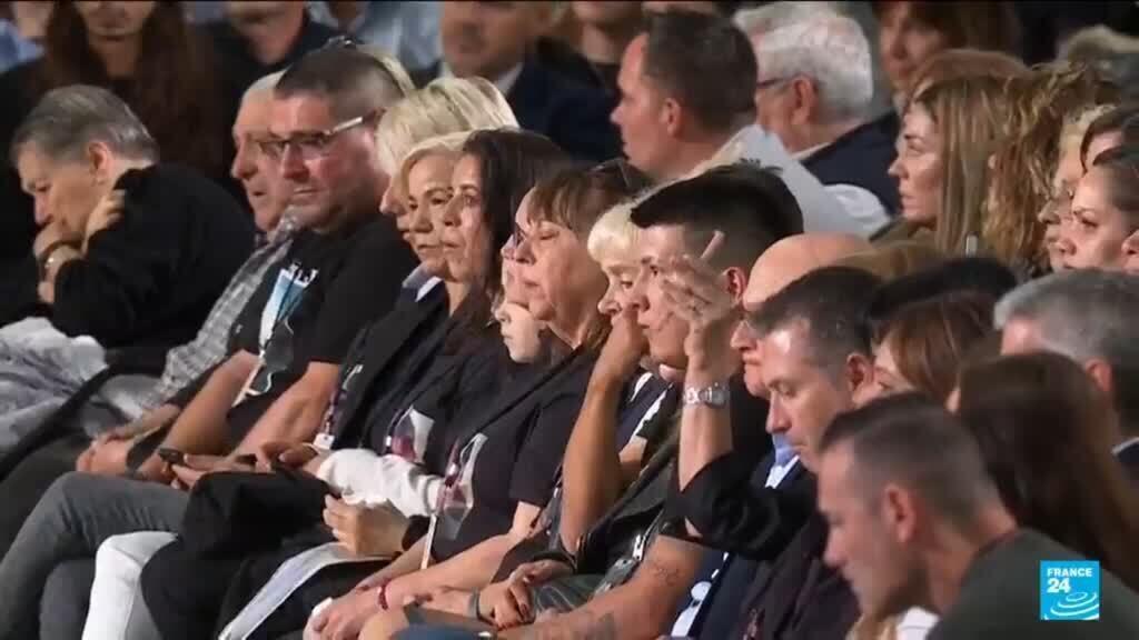 A year on, families of Spain's flood victims voice sorrow and rage at memorial ceremony