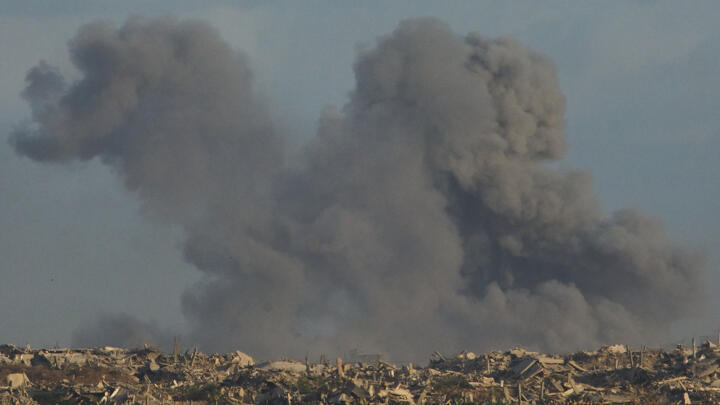 Smoke billows over Gaza Strip following an Israeli bombardment, as seen from southern Israell, on October 5, 2025. 