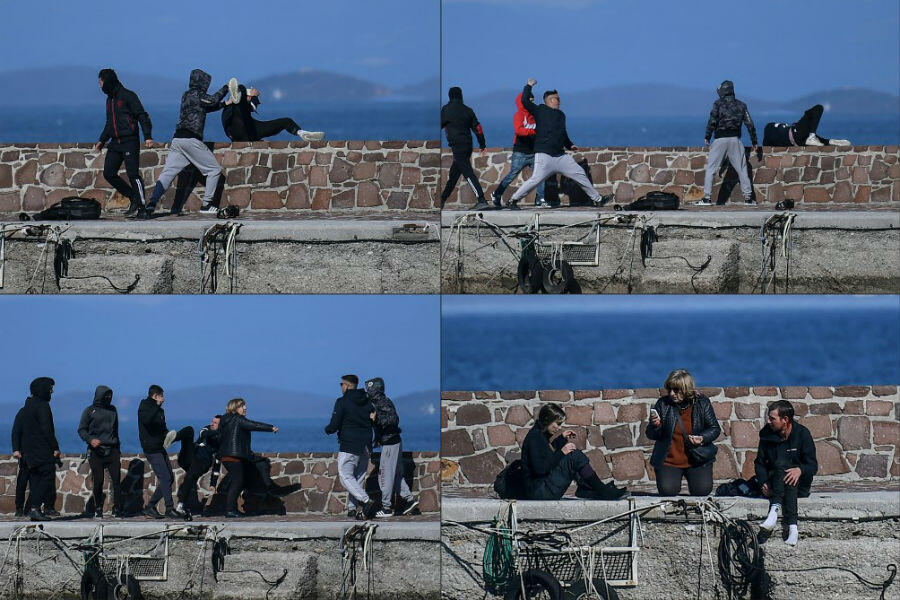 Un journaliste est attaqué par des résidents de Lesbos qui tentent d'empêcher une embarcation de migrants de débarquer sur l'île, le 1er mars 2020. Une femme vient ensuite à son secours.