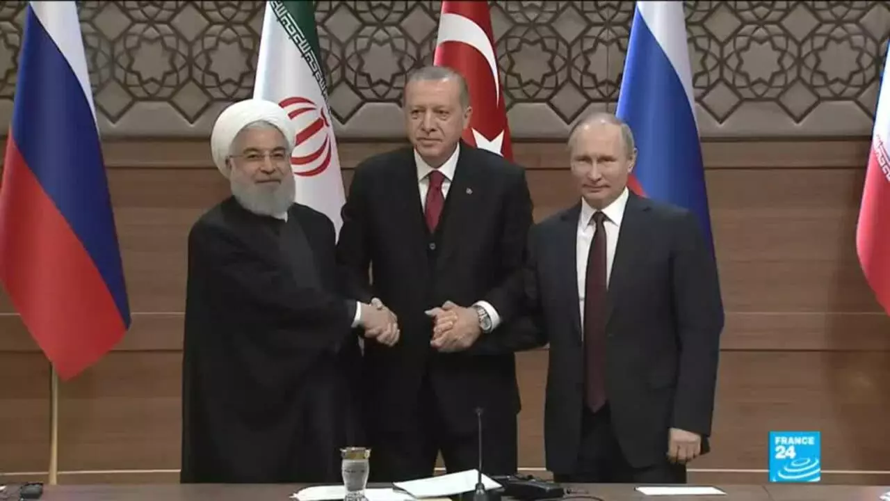 War In Syria A Symbolic Handshake Between Rouhani Putin And Erdogan France 24