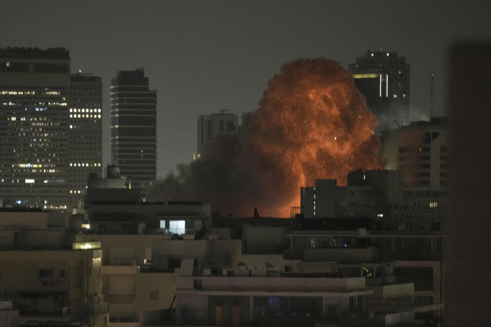An explosion is seen during a missile attack in Tel Aviv, Israel.