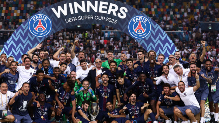 Paris Saint-Germain's celebrate after winning the 2025 UEFA Super Cup final against Tottenham Hotspur FC at the Friuli stadium, in Udine, on August 13, 2025.
