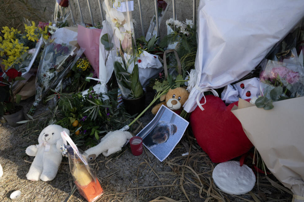 Fans left flowers near a barrier leading to her home in Saint-Tropez