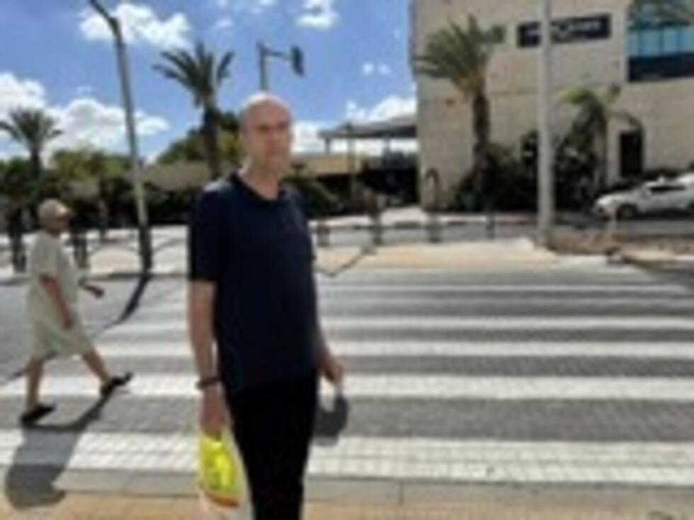 Dany Hadar standing in front of a shopping centre in the Israeli settlement of Ma’ale Adumim. 