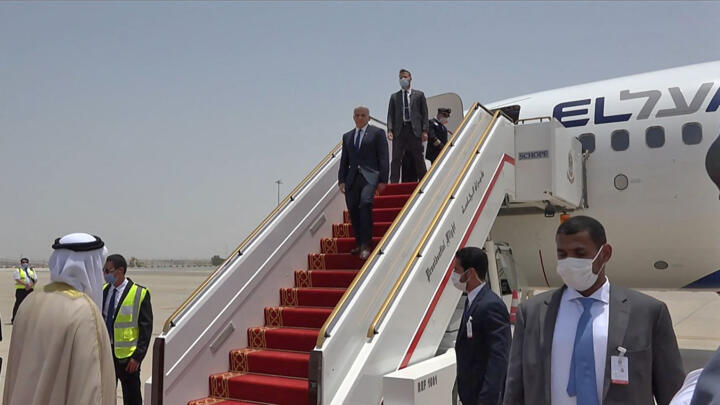 A grab from an AFPTV video shows Israeli alternate prime minister and Foreign Minister Yair Lapid leaving the plane upon landing at Abu Dhabi airport, in the United Arab Emirates (UAE), on June 29, 2021.