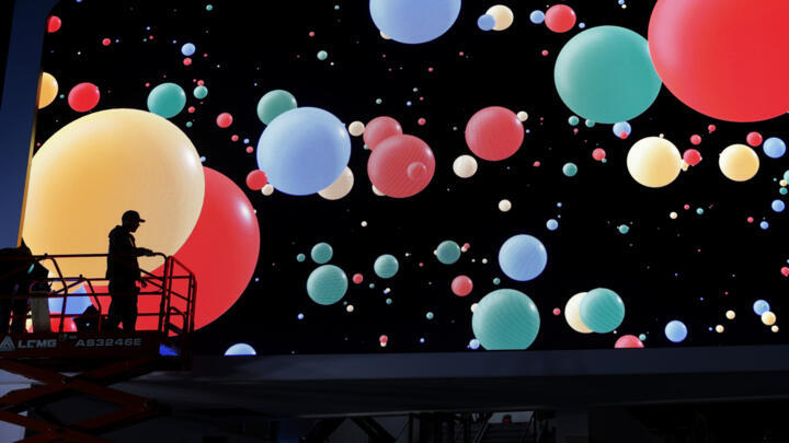 A worker helps set up the Google booth before CES International, in Las Vegas, USA, on January 4, 2020.