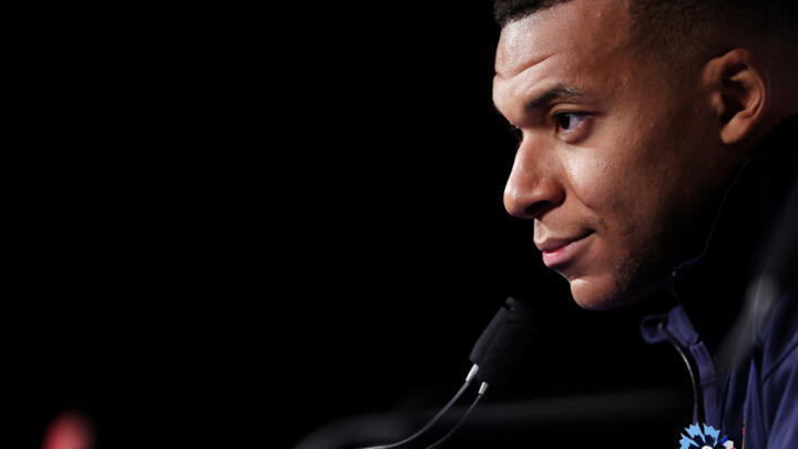 France's forward Kylian Mbappe looks on during a press conference at the Parc des Princes stadium, in Paris.