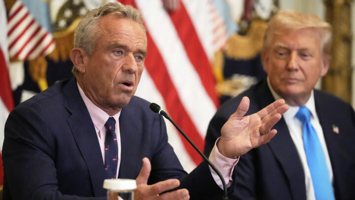 Health and Human Services Secretary Robert F. Kennedy Jr. speaks as President Donald Trump listens at an event to promote his proposal to improve Americans' access to their medical records in the East