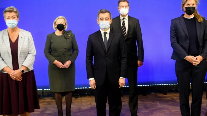 French Interior Minister Gerald Darmanin (c) and his European counterparts attend a meeting in response to cross-Channel migration, in Calais, France, November 28, 2021.