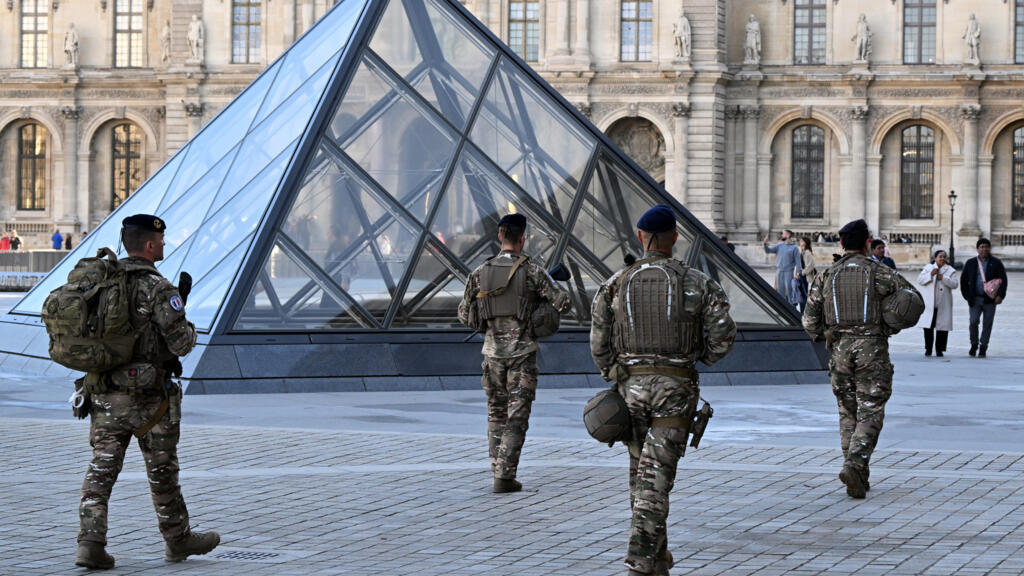 Woman, 38, charged over audacious jewel heist at Louvre