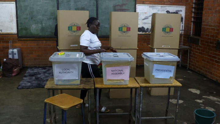 A worker prepares ballot boxes ahead of Zimbabwean elections in Warren Park, Harare on August 22, 2023. 